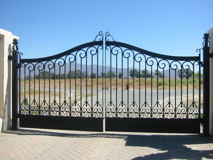 Pin on wrought iron gates